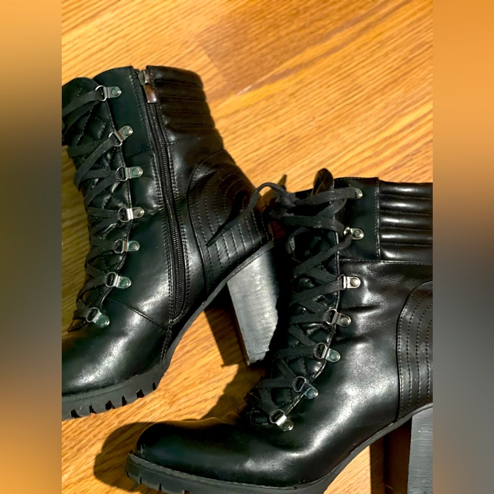 Healed Black boots.   Amazingly sexy and comfortable size 12